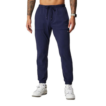 Fabletics Men's The One Jogger, Quick-Dry, Hidden Pockets, Zip Pockets, UPF Protection, Anti-Stink, Lightweight, M/Regular 29 in | 29, Deep Navy